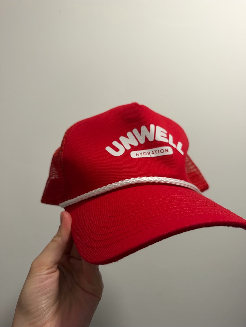Hydration Red Trucker Hat pose size unisex